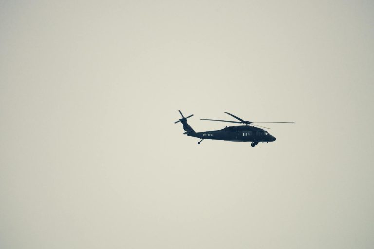 Giant American Flag Unfurled as Helicopters Monitor a Charged Airspace featured image